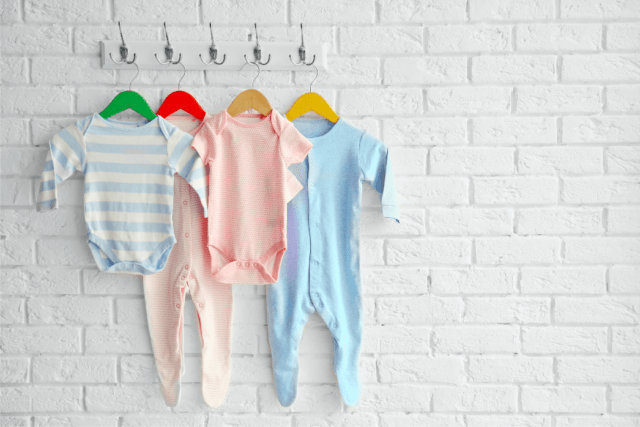 Baby wear hanging on a wall